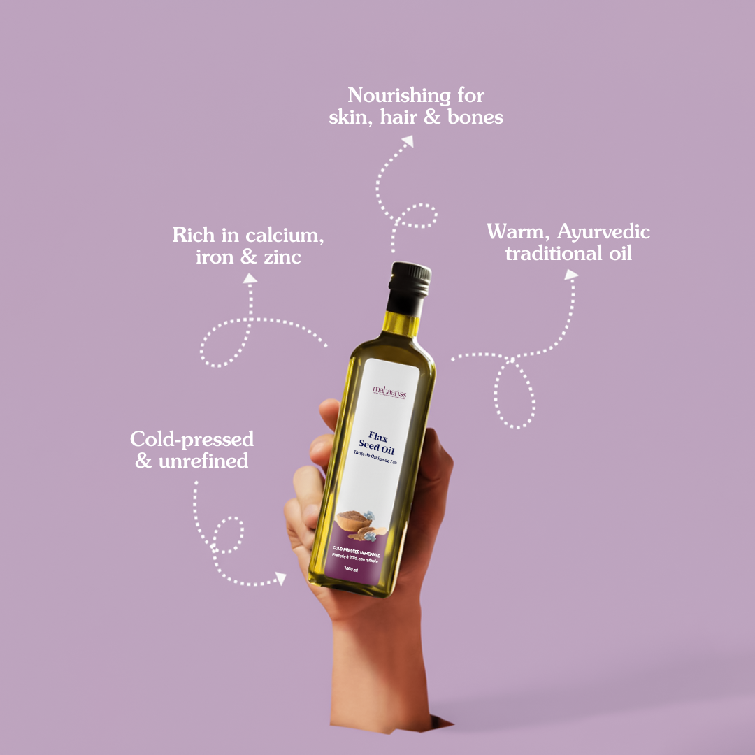 Bottle of Infused Flax Seed Oil held by a hand on a purple background with text about the oil's benefits.