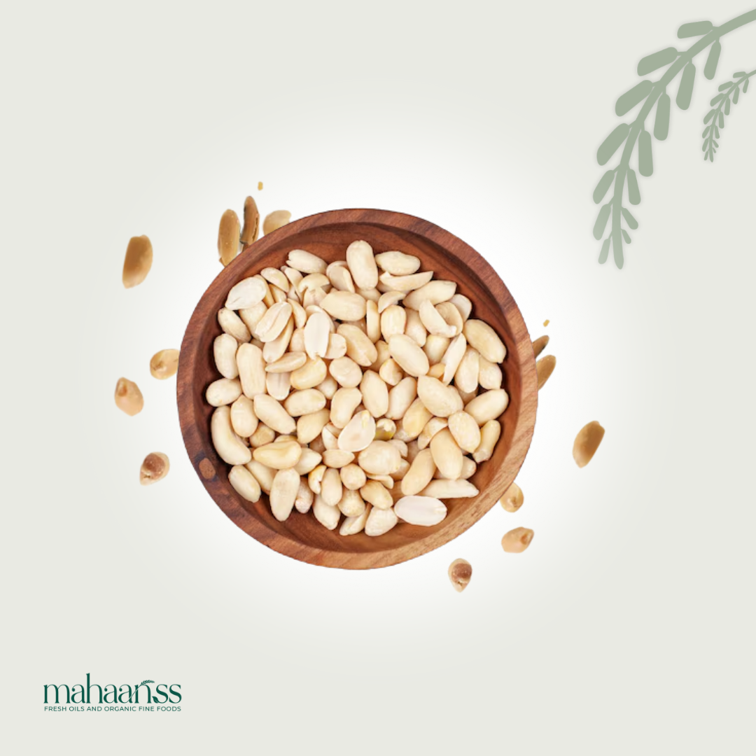 Wooden bowl filled with pine nuts on a light background with 'mahaaiss' branding.