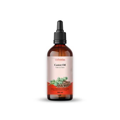 Bottle of castor oil with a label on a white background