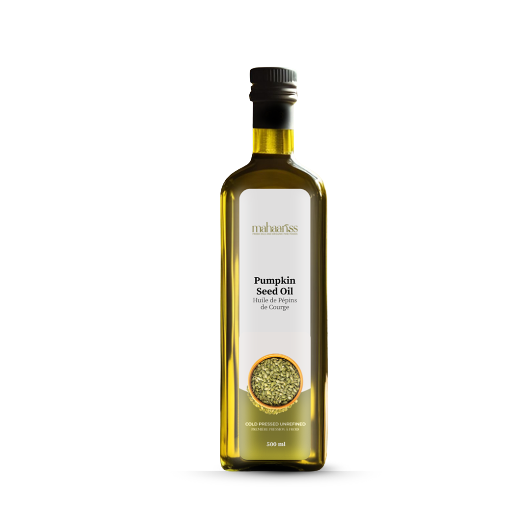 Bottle of pumpkin seed oil with a label on a white background