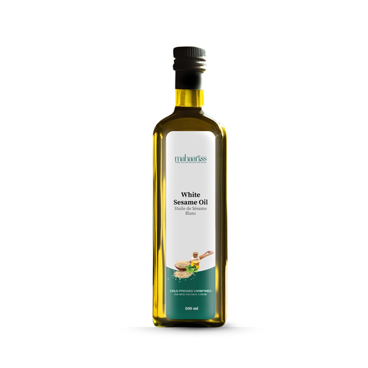 Bottle of White Sesame Oil with a label on a white background