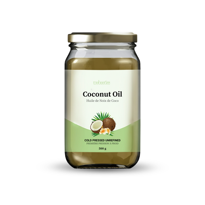 Jar of coconut oil with a green label on a white background