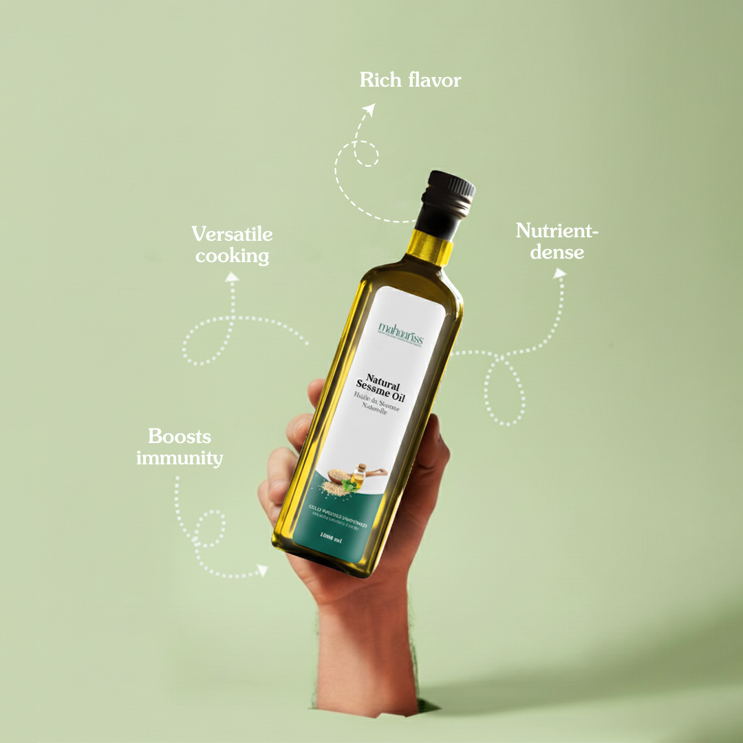 Hand holding a bottle of natural sesame oil with text highlighting its benefits on a light green background