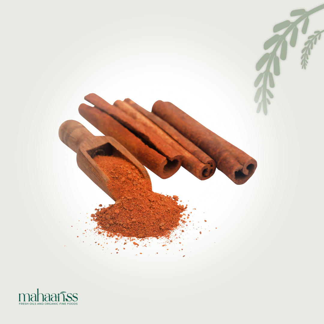 Cinnamon sticks and ground cinnamon on a white background with 'maharajiss' branding.