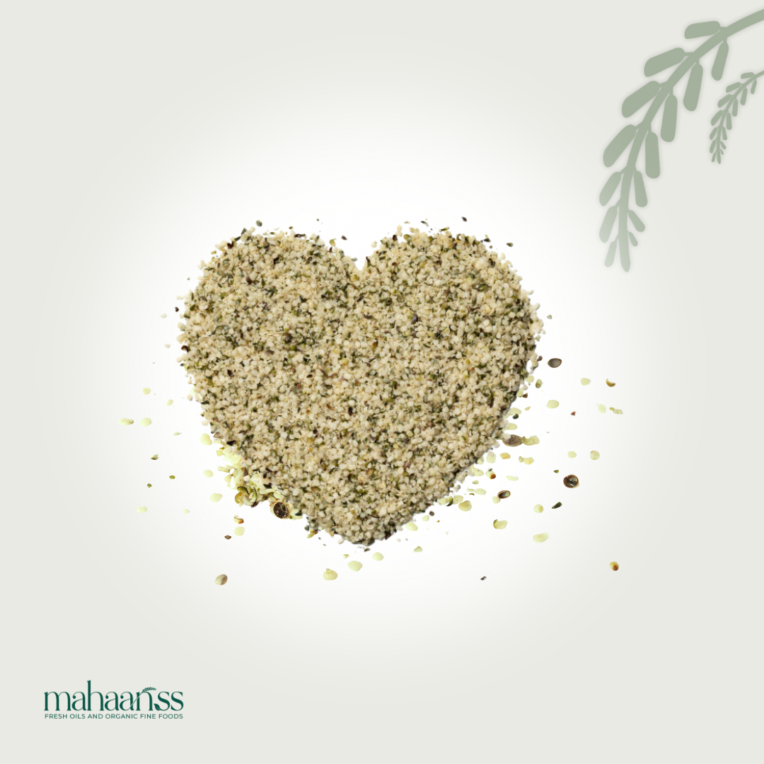 Heart-shaped pile of green seeds on a light gray background with 'maharajiss' branding.