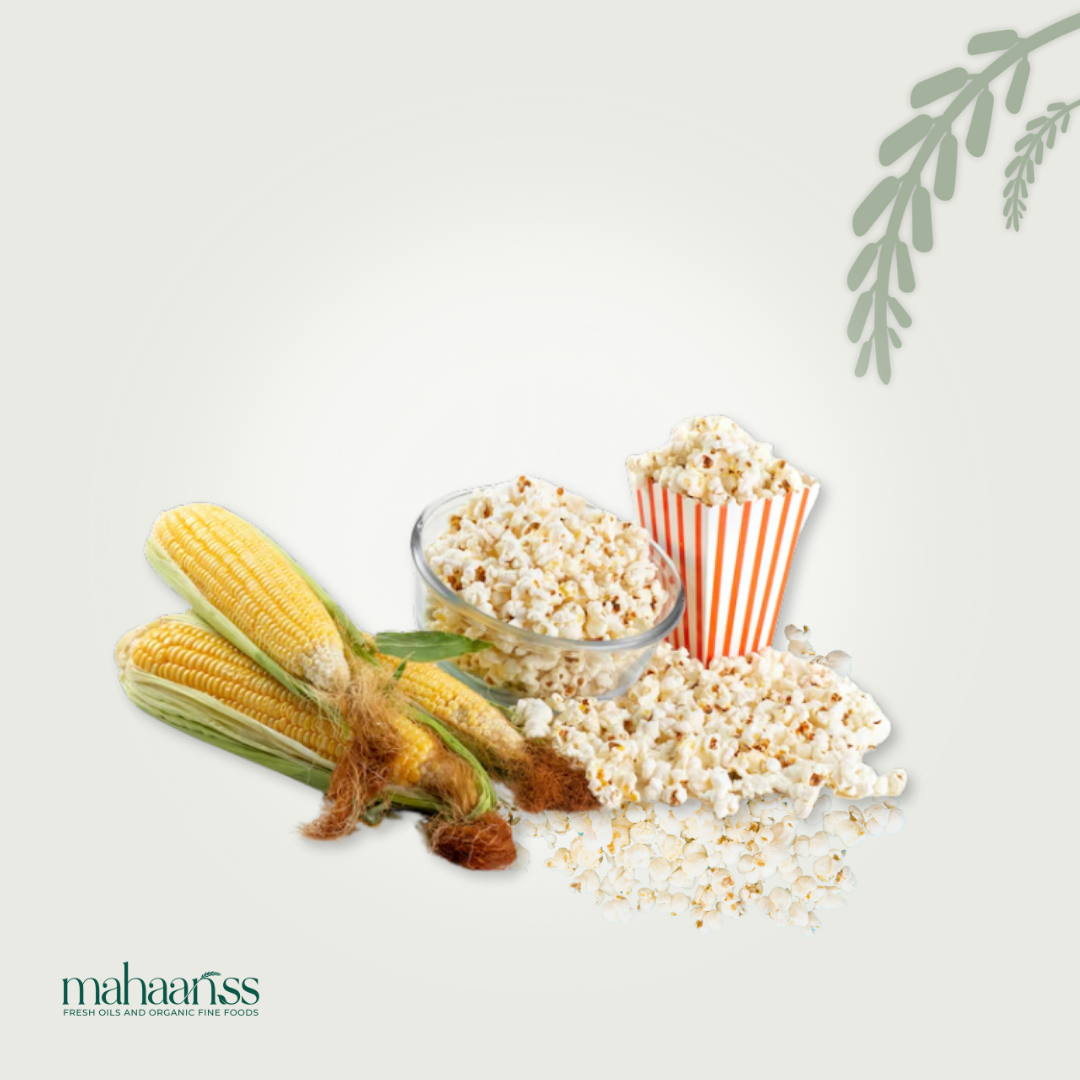Popcorn kernels, popcorn in a bowl, and popcorn in a striped container on a light background with 'mahaanss' branding.